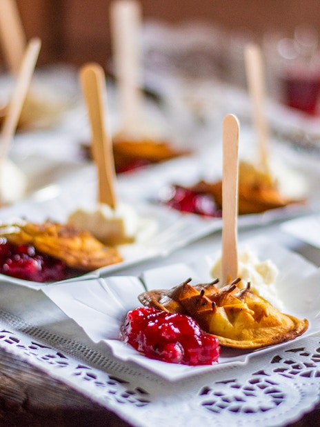 Cheese tasting plates with fruit preserves in Zakopane, Poland.