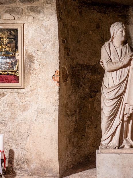 Crypt of Santa Reparata statue and relic display at Florence Cathedral.