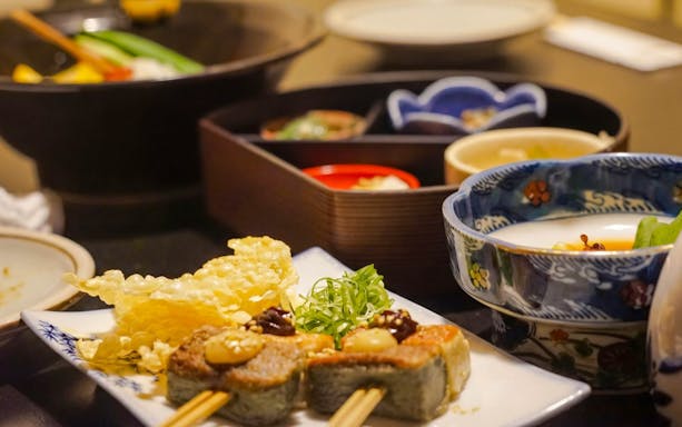 Traditional Japanese dishes on a Kyoto night foodie tour.