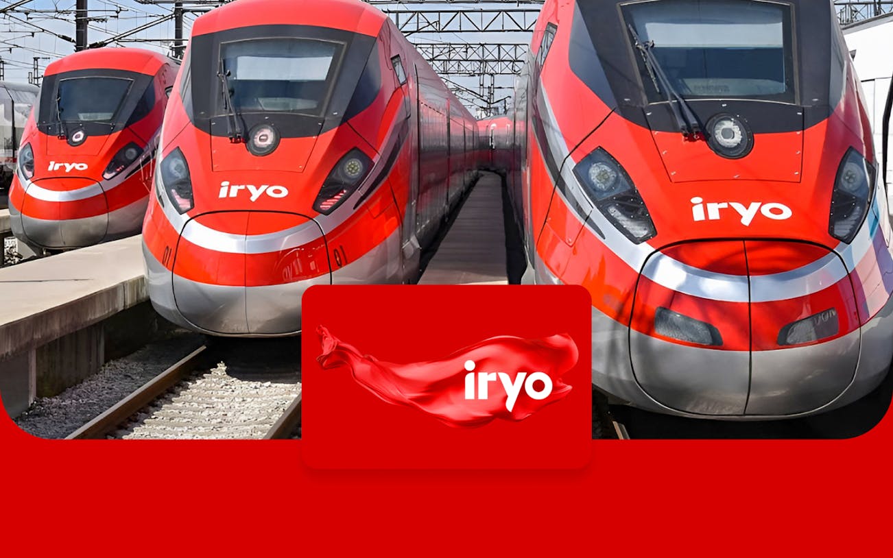 High-speed Iryo trains at station for Barcelona Sants to Madrid Atocha route.