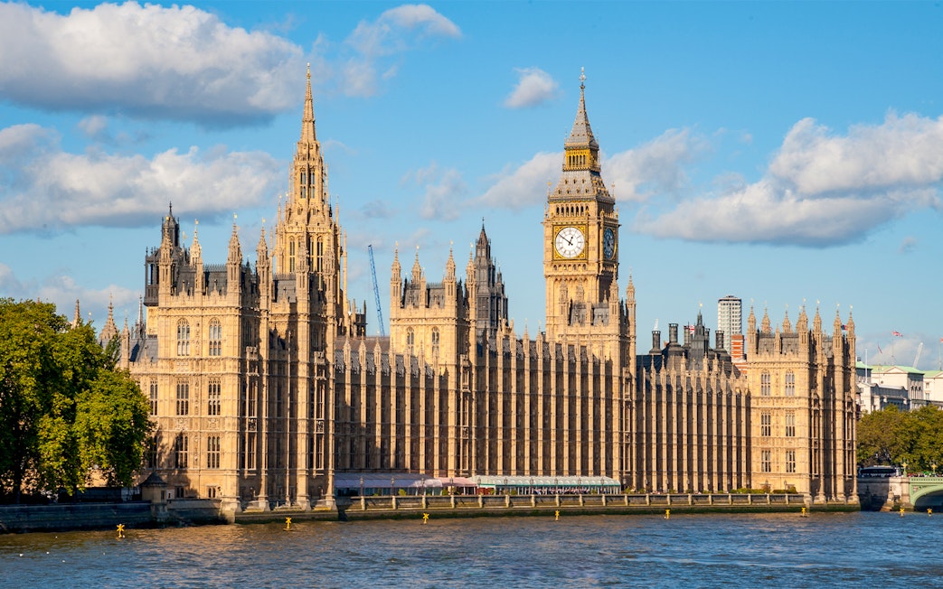 Houses of Parliament and Big Ben by the River Thames in London, UK.