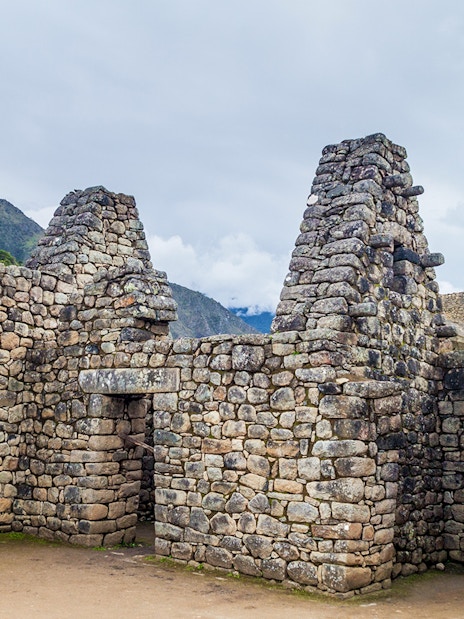 Stone structure with three doorways at Machu Picchu, Peru.