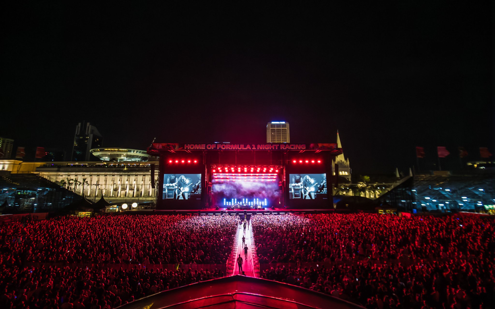 Padang Stage concert with large crowd in Zone 4 at night, Singapore.