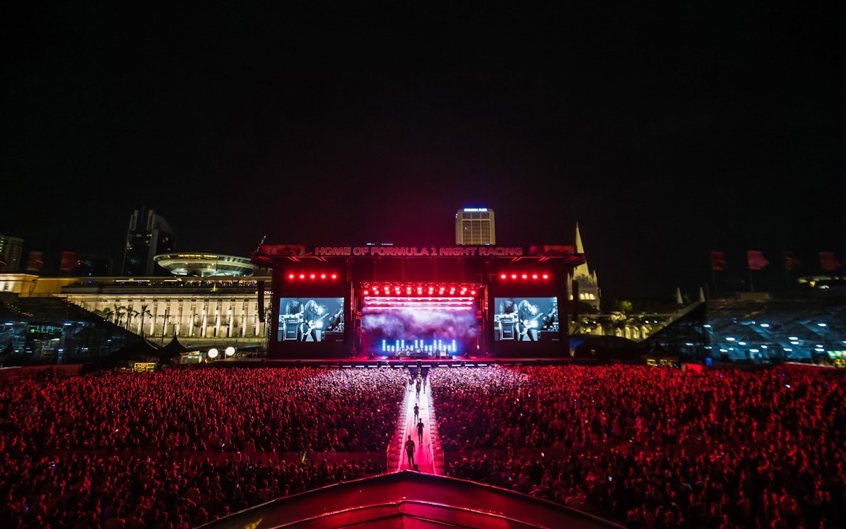 Padang Stage concert with large crowd in Zone 4 at night, Singapore.
