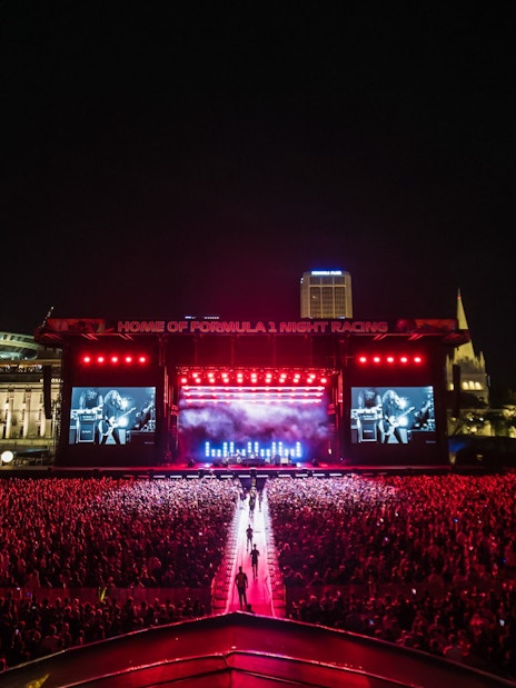 Padang Stage concert with large crowd in Zone 4 at night, Singapore.