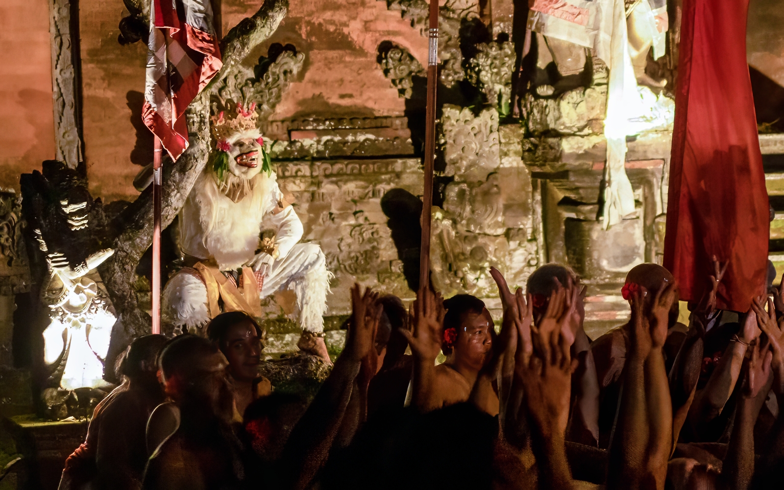 Kecak and Fire Dance performance at Ubud Peliatan Palace with performers in traditional costumes.