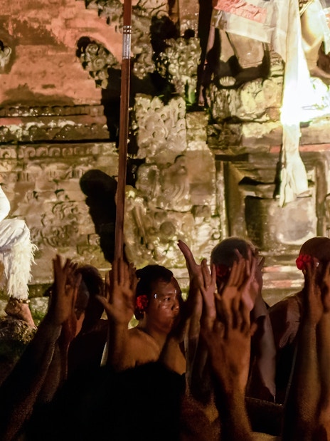 Kecak and Fire Dance performance at Ubud Peliatan Palace with performers in traditional costumes.