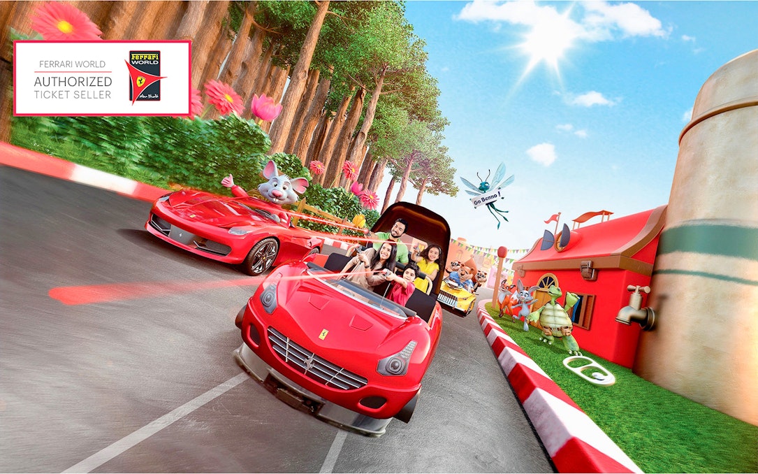 Family enjoying a ride at Ferrari World Abu Dhabi with animated characters and vibrant scenery.