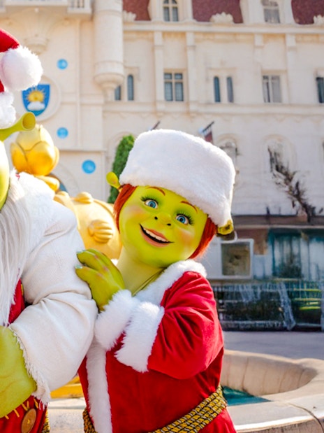 Shrek and Fiona in Christmas outfits at Universal Studios Singapore.