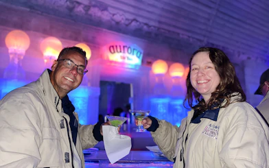 Guests enjoying drinks at the Aurora Ice Bar during Chena Hot Springs Day Tour.