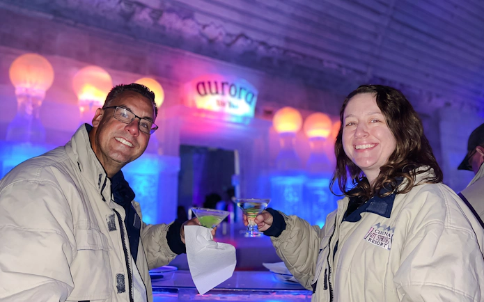 Guests enjoying drinks at the Aurora Ice Bar during Chena Hot Springs Day Tour.