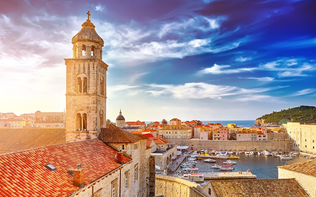 Old Town Dubrovnik with bell tower and harbor, featured in Game of Thrones tour.
