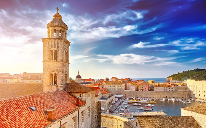 Old Town Dubrovnik with bell tower and harbor, featured in Game of Thrones tour.
