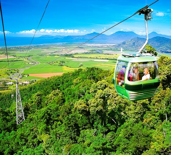 Skyrail Rainforest Cableway over lush forest in Cairns, Australia.