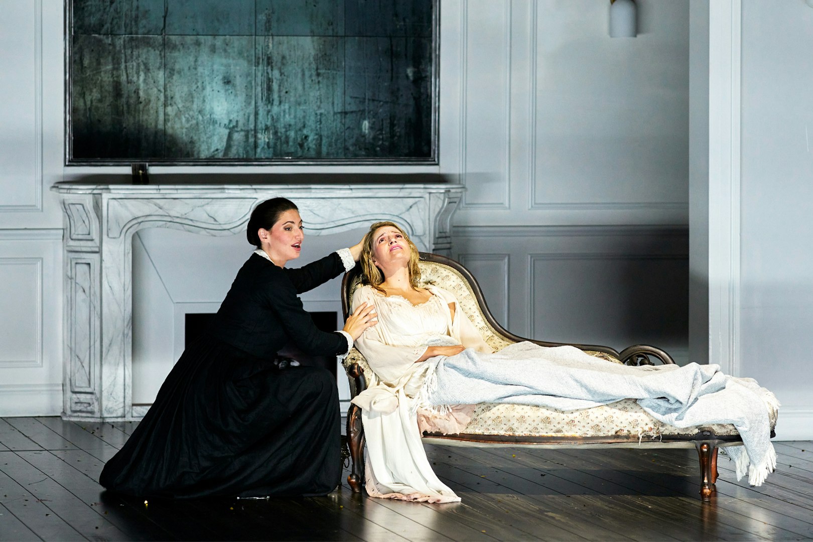 Opera performers in a dramatic scene from La Traviata at Sydney Opera House.