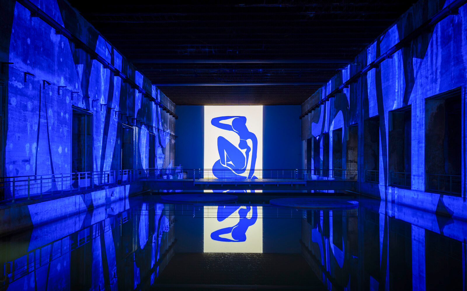 Matisse artwork projected in blue at Bassins des Lumières exhibition.