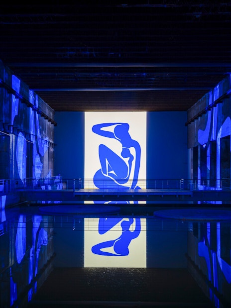 Matisse artwork projected in blue at Bassins des Lumières exhibition.