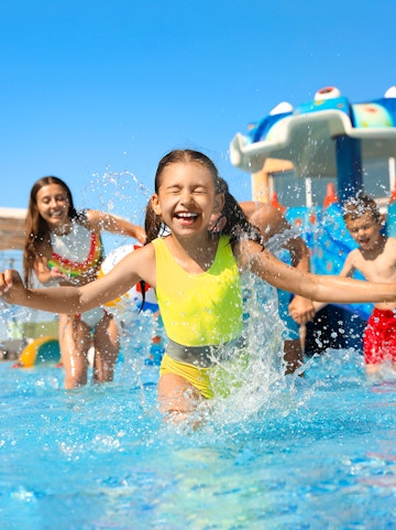 Children playing in a pool at Wet World Water Park.