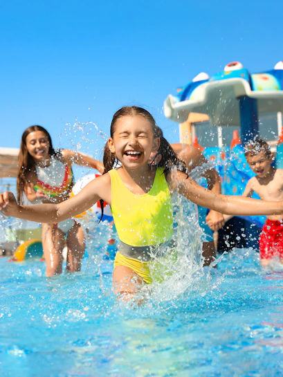 Children playing in a pool at Wet World Water Park.