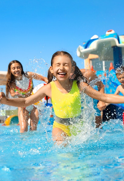 Children playing in a pool at Wet World Water Park.