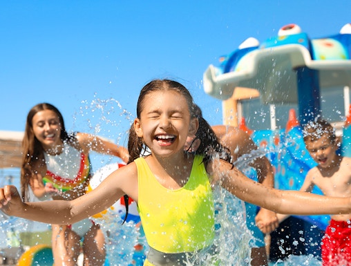 Children playing in a pool at Wet World Water Park.