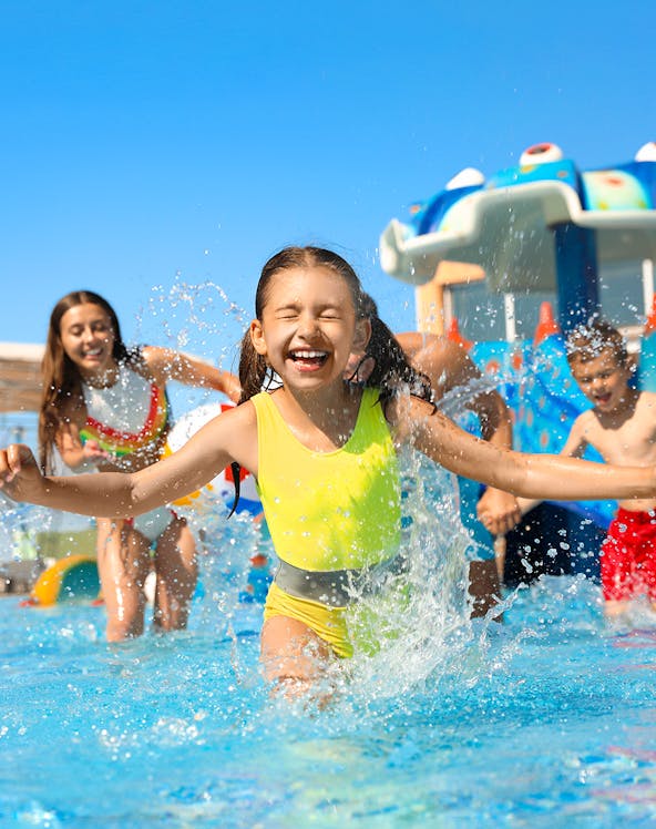 Children playing in a pool at Wet World Water Park.