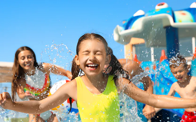 Children playing in a pool at Wet World Water Park.
