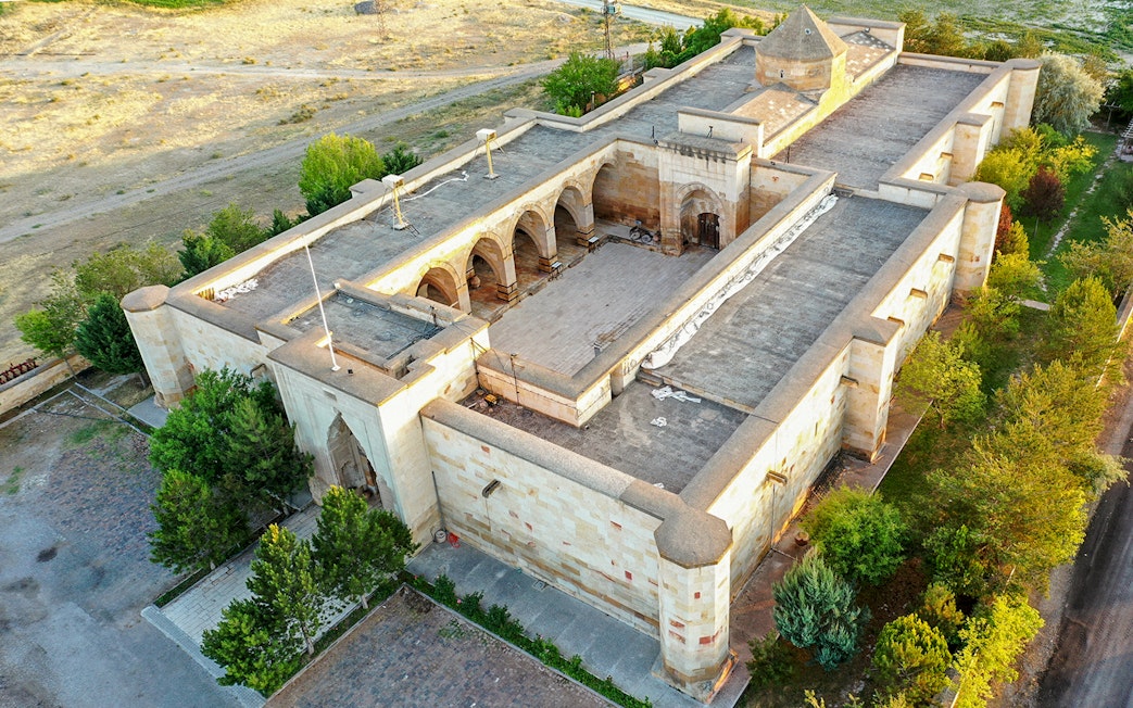 Aerial view of Saruhan Caravanserai in Cappadocia, Turkey, a venue for Whirling Dervishes performances.