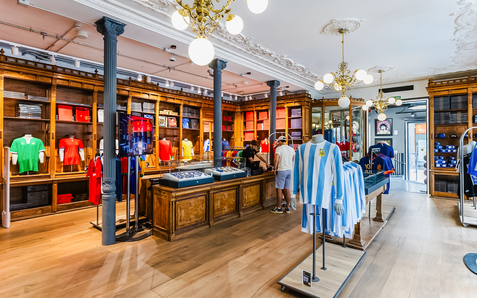 Legends: The Home of Football Museum entrance with iconic football memorabilia display, Manchester, UK.