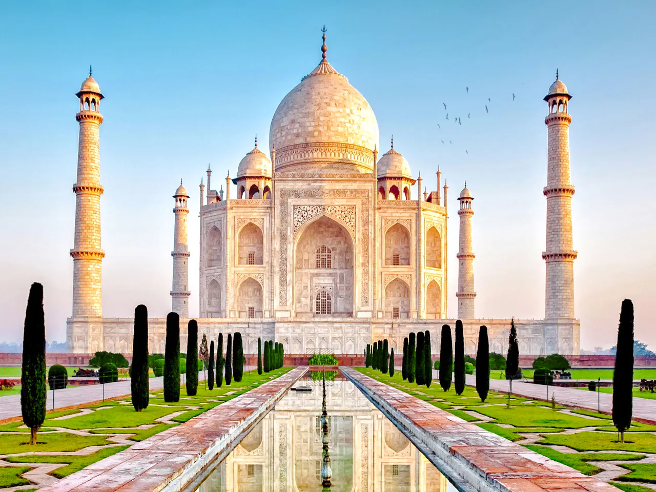 Taj Mahal with reflecting pool, part of Skip the Line Taj Mahal and Agra Fort Tour from Delhi.