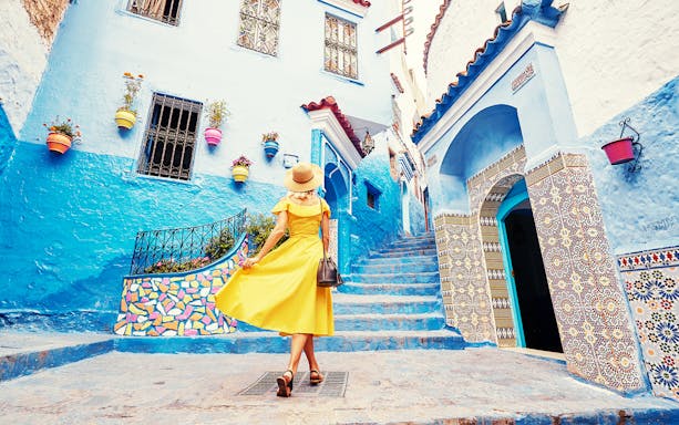 Chefchaouen blue-washed buildings and narrow alleyways on a day trip from Fez.