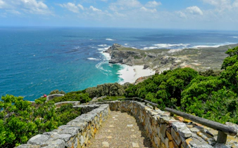 Stone path leading to Cape of Good Hope with ocean view, Cape Point, Cape Town, South Africa.