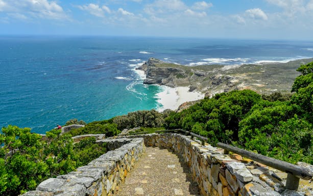 Stone path leading to Cape of Good Hope with ocean view, Cape Point, Cape Town, South Africa.