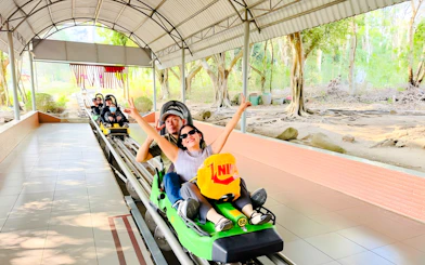 Visitors enjoying a roller coaster ride at Black Virgin Mountain, Tay Ninh.