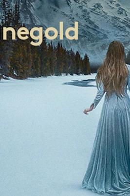 Person in a long dress walking on snow with mountains and trees in the background, related to The Rhinegold.