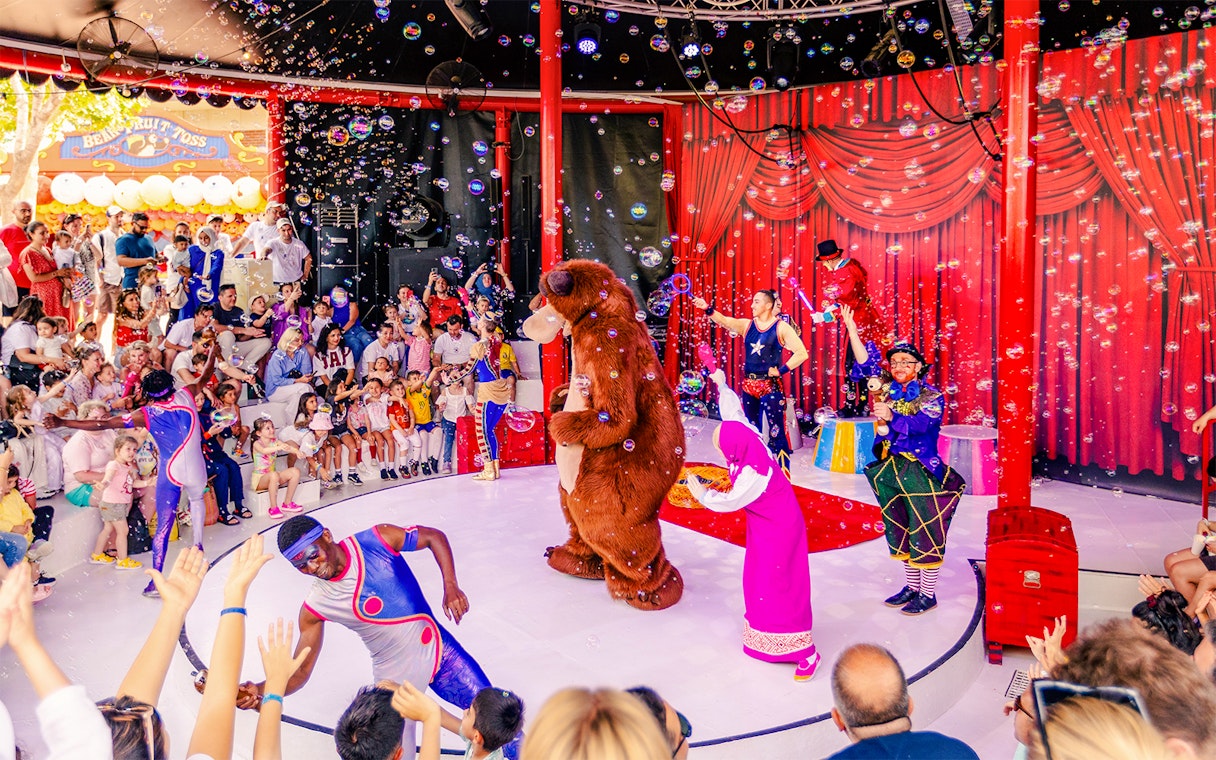 Masha and the Bear performing at The Land of Legends theme park circus show.