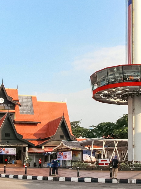 Tourists viewing Melaka from Menara Taming Sari tower.