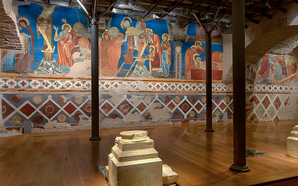 Frescoes inside Siena Cathedral depicting religious scenes, Italy.