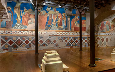 Frescoes inside Siena Cathedral depicting religious scenes, Italy.