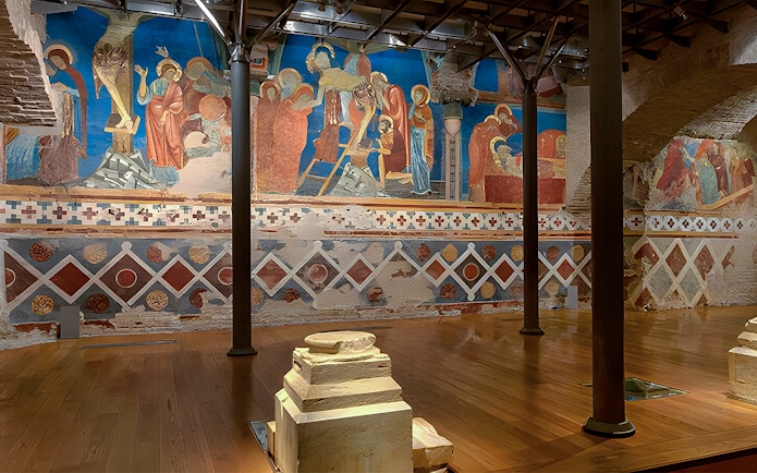 Frescoes inside Siena Cathedral depicting religious scenes, Italy.