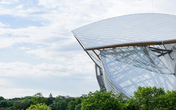 Fondation Louis Vuitton's glass architecture in Paris, France.