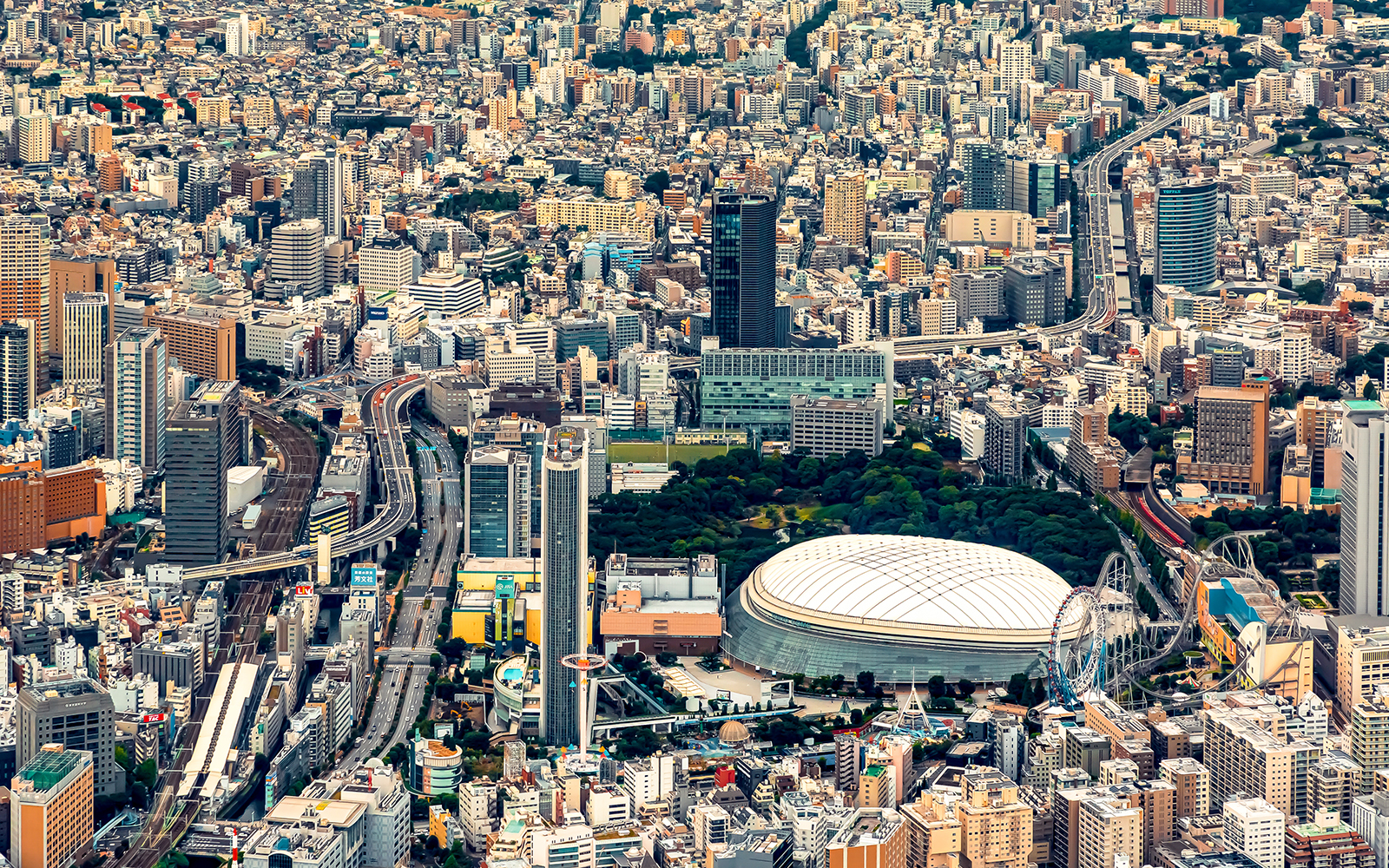 Tokyo Dome aerial view, central Tokyo, Japan, highlighting baseball experience location.
