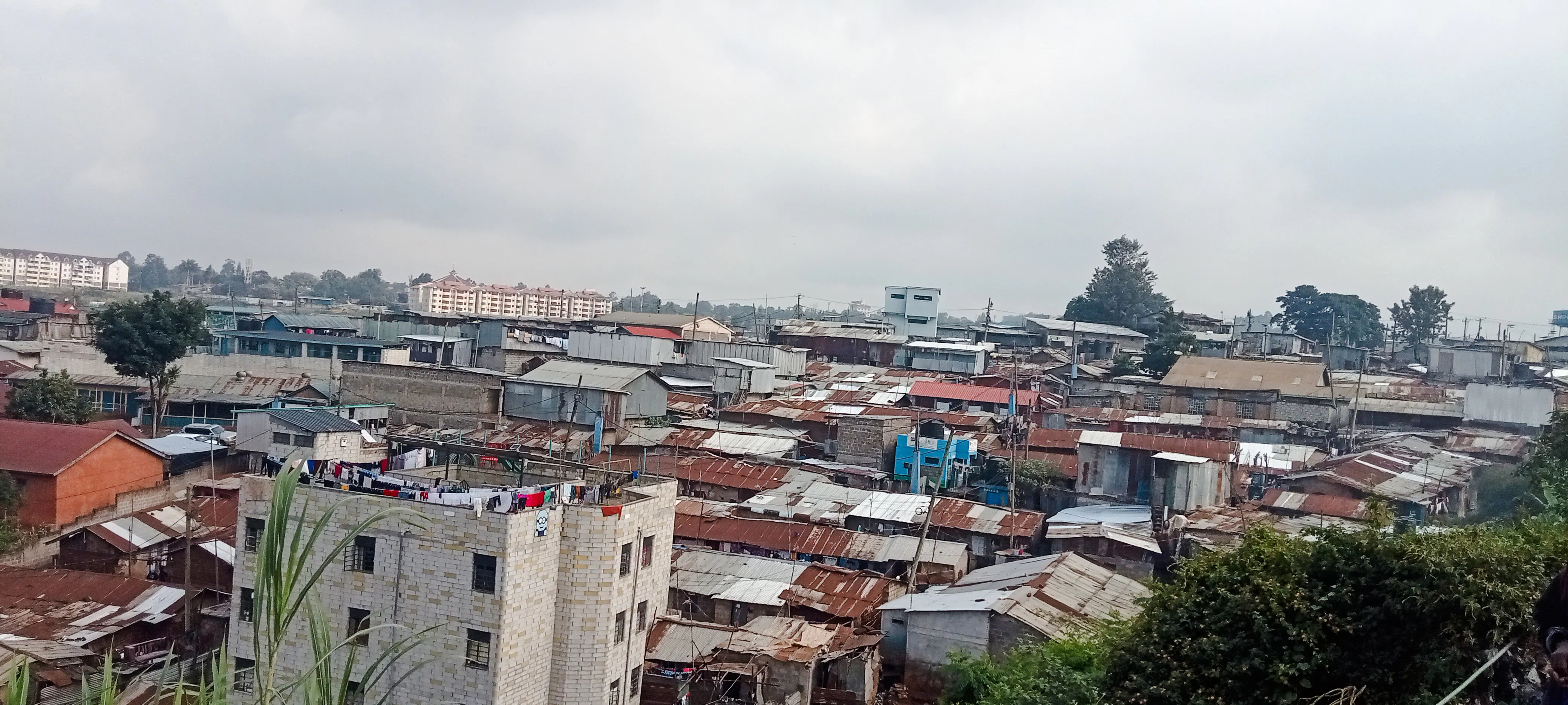 Rooftops of Kibera neighborhood in Nairobi, showcasing local architecture and community layout.