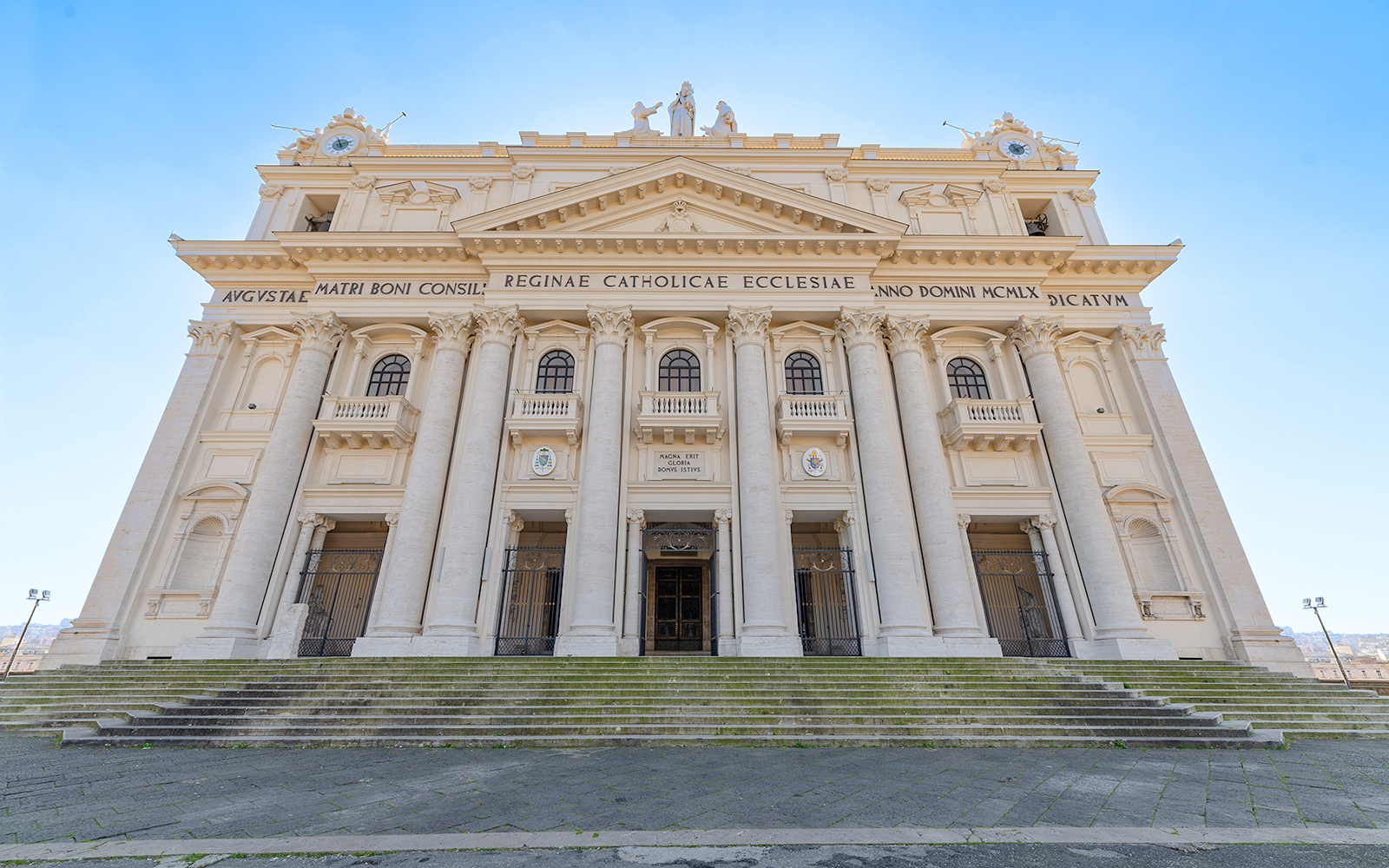 Madre del Buon Consiglio Basilica exterior with intricate architectural details in Naples, Italy.