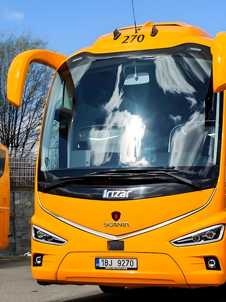 RegioJet bus parked in Prague terminal.