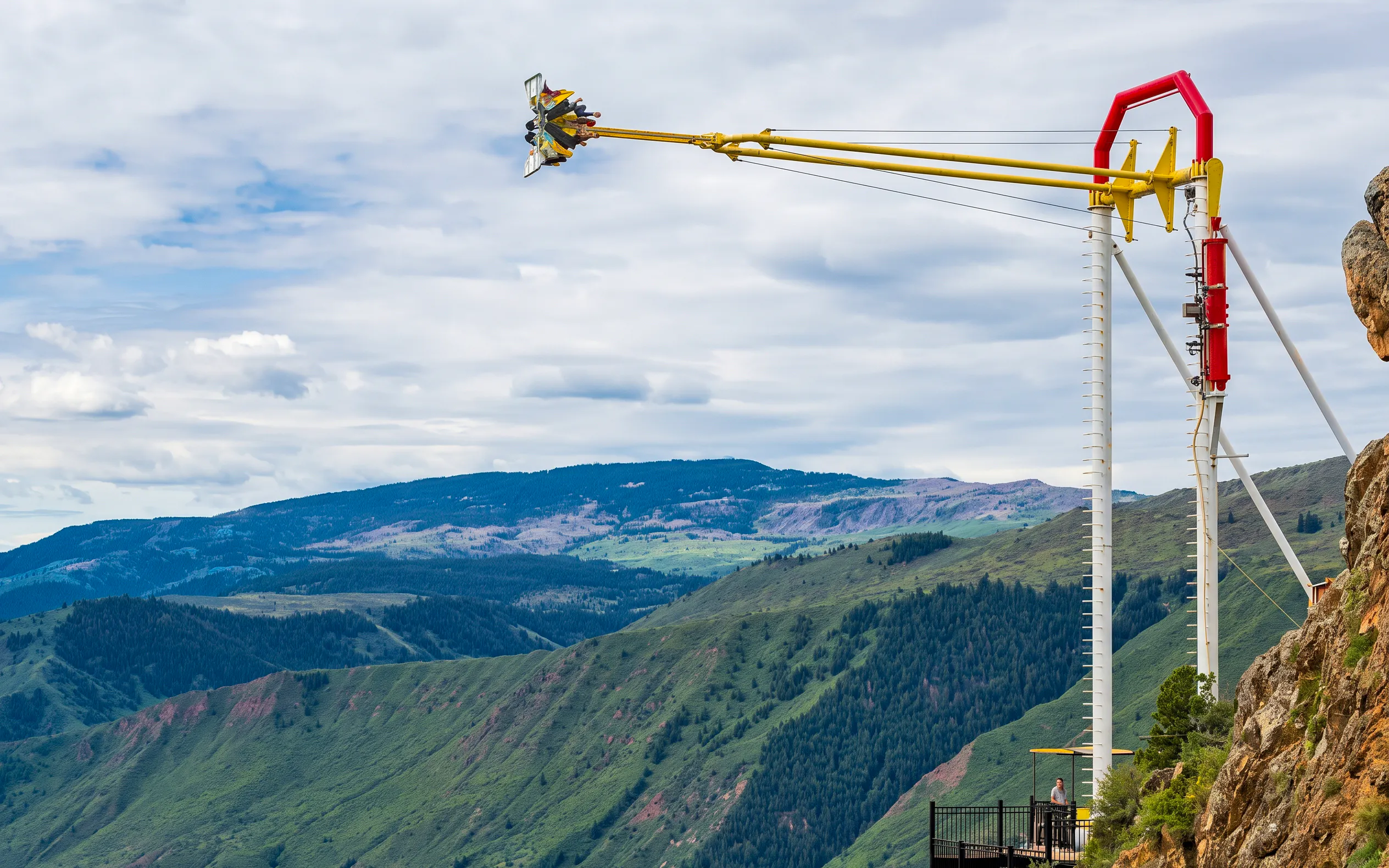 Thrill ride at Glenwood Caverns Adventure Park with mountain views.