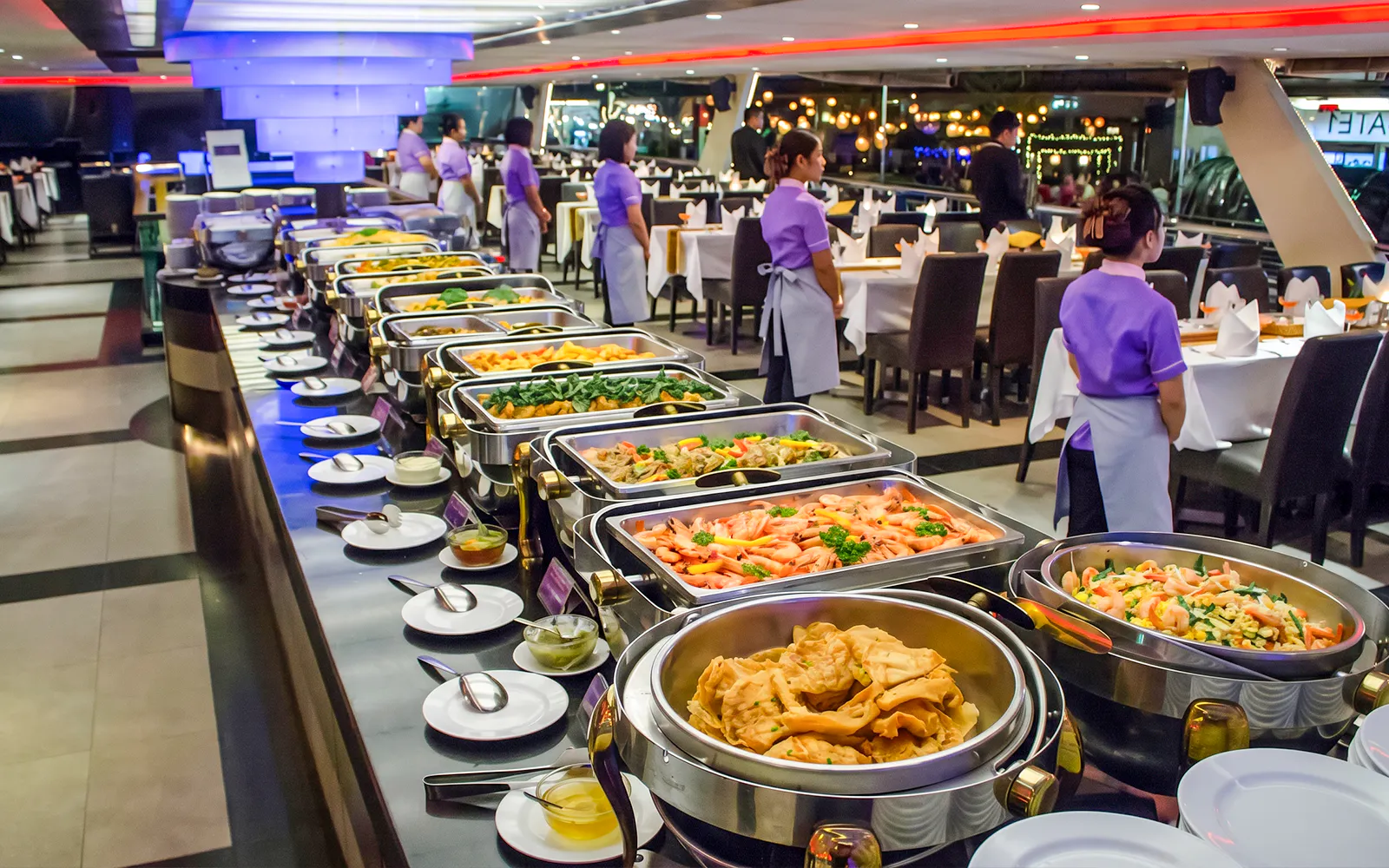 Buffet setup on Chao Phraya Princess dinner cruise during Loy Krathong festival in Bangkok.