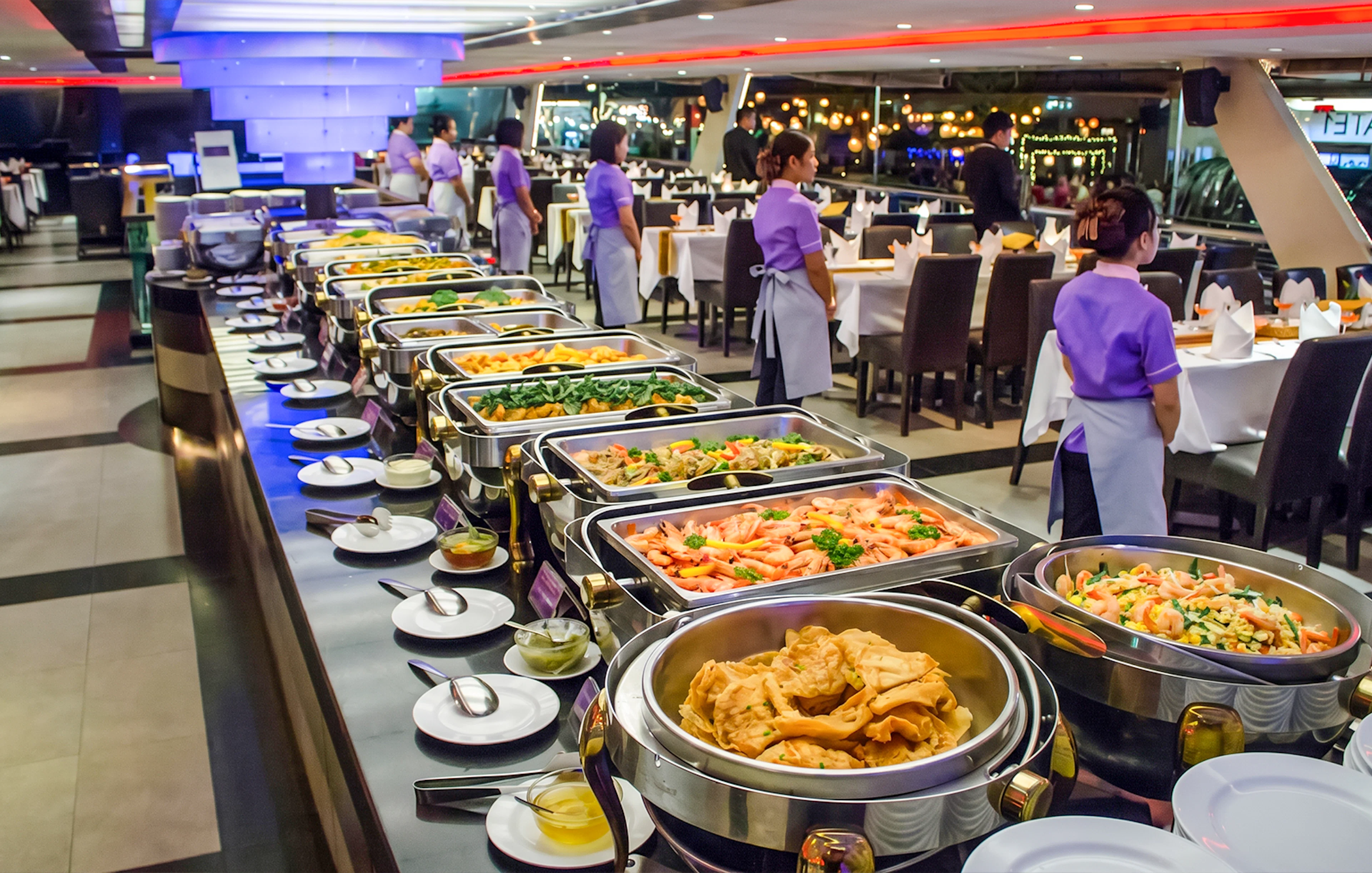 Buffet setup on Chao Phraya Princess dinner cruise during Loy Krathong festival in Bangkok.
