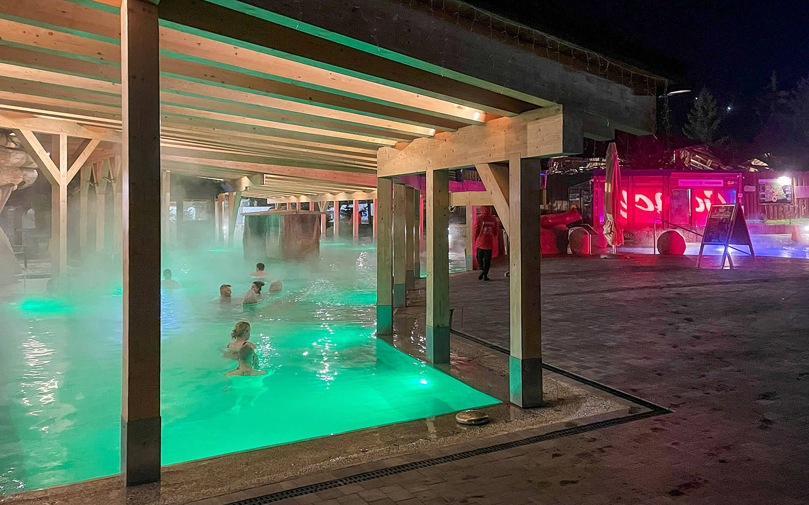 Thermal bath with people relaxing in Zakopane, Poland, during the Krakow snowmobile tour.