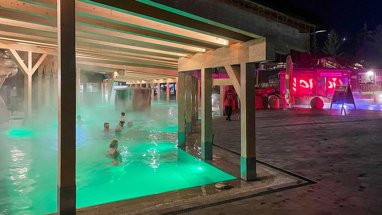 Thermal bath with people relaxing in Zakopane, Poland, during the Krakow snowmobile tour.